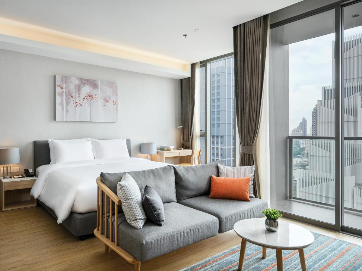 Oakwood Suites Bangkok Exterior foto Deluxe Room