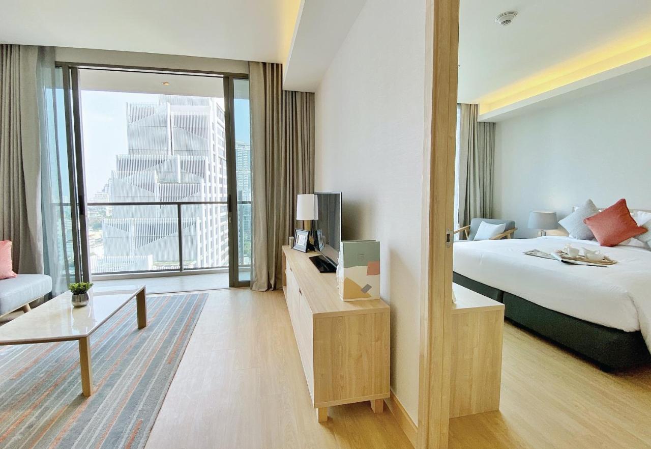 Oakwood Suites Bangkok Exterior foto Deluxe Suite